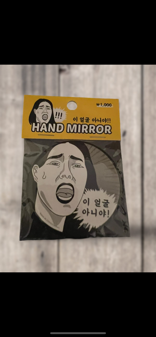 Hand mirror مرآة